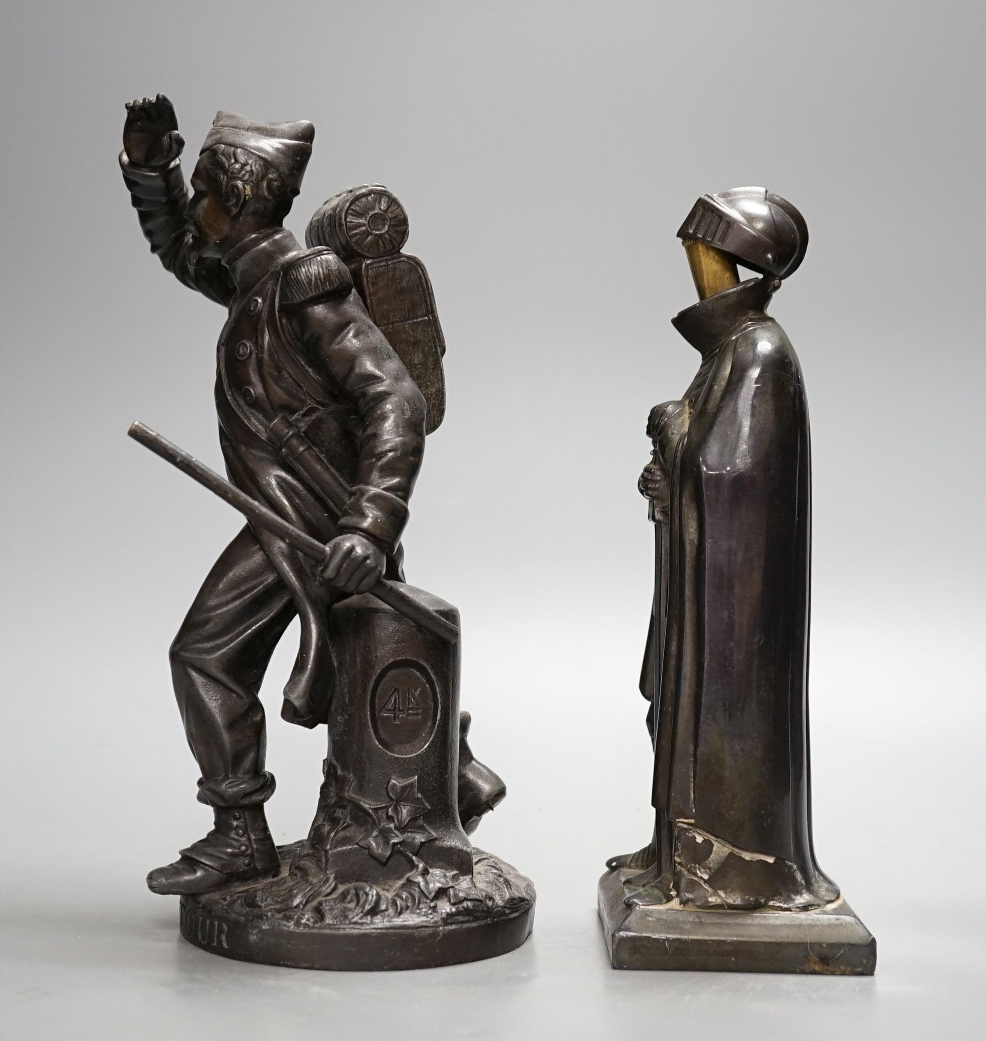 A spelter figure, 'Le Retour' and a similar 'knight' table lighter 27cm